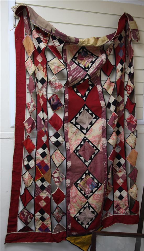 An Uzbekistan patchwork bridal blanket or wall hanging, 6ft 2in. x 4ft 5in.